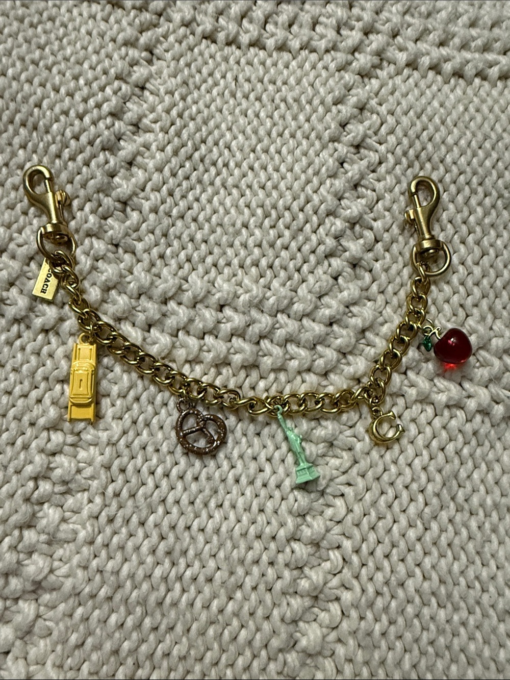 Coach Gold Charm Bracelet with Red, Yellow, Mint, and Rose-Gold Accents - Picture 3 of 6
